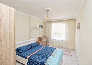 Трехкомнатная квартира в районе Махмутлар