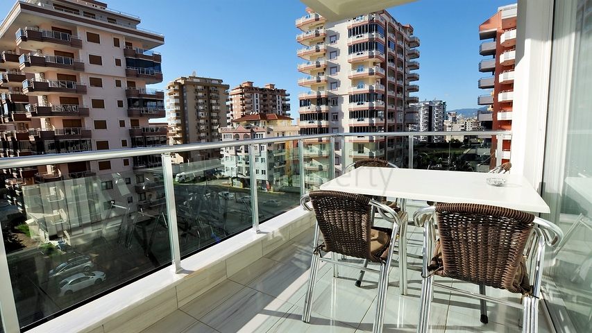 Меблированная квартира 1+1 в районе Махмутлар