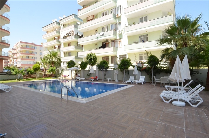 Меблированная квартира 1+1 в районе Махмутлар