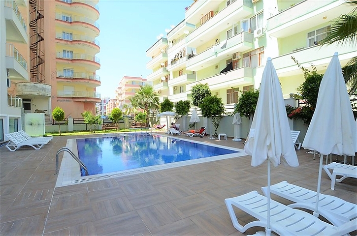 Меблированная квартира 1+1 в районе Махмутлар