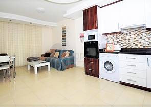 Меблированная квартира планировки 1+1 в Махмутларе