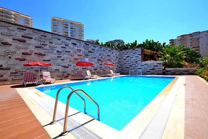 Двухкомнатная квартира в районе Махмутлар