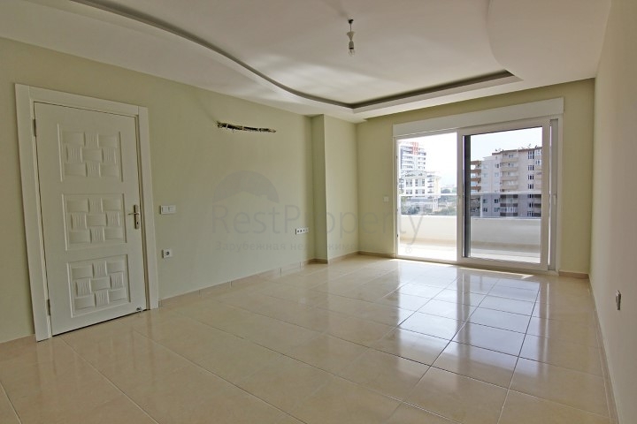 Двухкомнатная квартира в районе Махмутлар