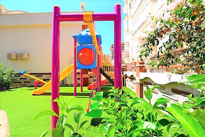 Двухкомнатная квартира в районе Махмутлар