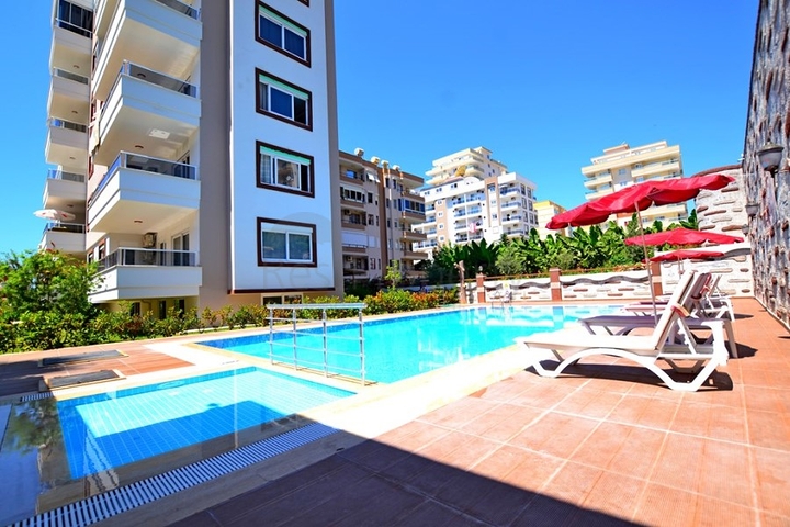 Двухкомнатная квартира в районе Махмутлар