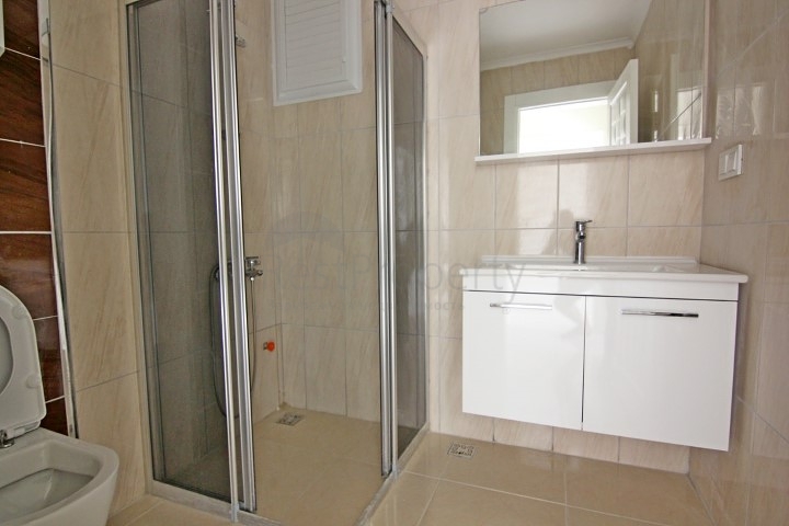 Двухкомнатная квартира в районе Махмутлар