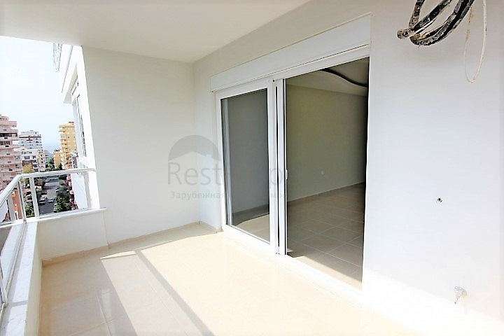 Двухкомнатная квартира в районе Махмутлар