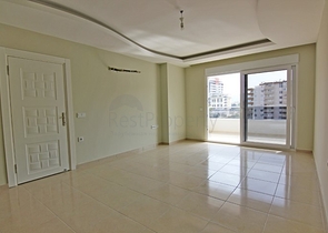 Двухкомнатная квартира в районе Махмутлар