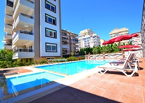 Двухкомнатная квартира в районе Махмутлар