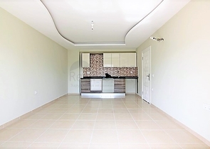 Двухкомнатная квартира в районе Махмутлар