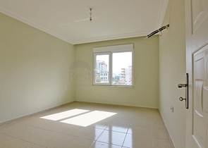 Двухкомнатная квартира в районе Махмутлар