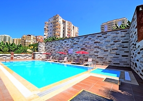 Двухкомнатная квартира в районе Махмутлар