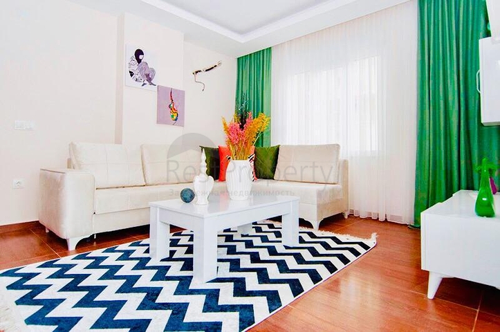 Двухкомнатная квартира в районе Махмутлар