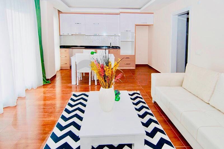 Двухкомнатная квартира в районе Махмутлар