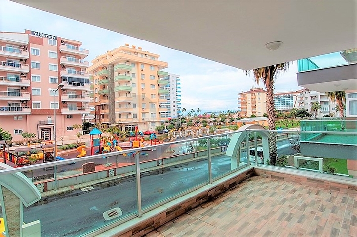 Двухкомнатная квартира в районе Махмутлар