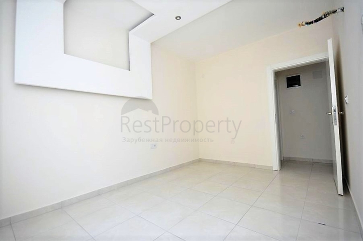 Двухкомнатная квартира в районе Махмутлар