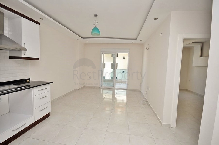 Двухкомнатная квартира в районе Махмутлар