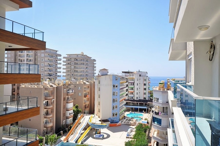 Двухкомнатная квартира в районе Махмутлар