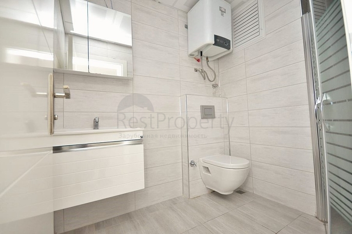 Двухкомнатная квартира в районе Махмутлар