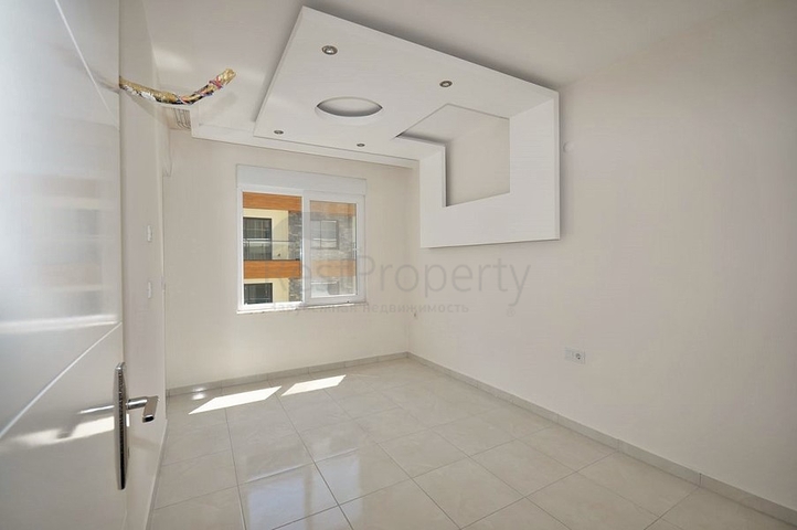 Двухкомнатная квартира в районе Махмутлар