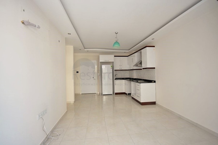 Двухкомнатная квартира в районе Махмутлар