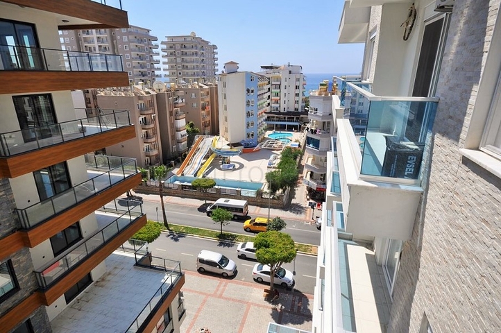 Двухкомнатная квартира в районе Махмутлар