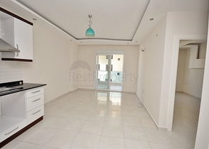 Двухкомнатная квартира в районе Махмутлар