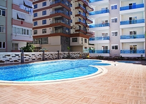 Двухкомнатная квартира в районе Махмутлар