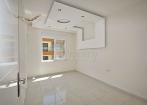 Двухкомнатная квартира в районе Махмутлар