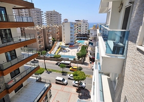 Двухкомнатная квартира в районе Махмутлар