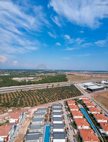 Виллы 4+1 в комплексе в Дошемеальты Анталья