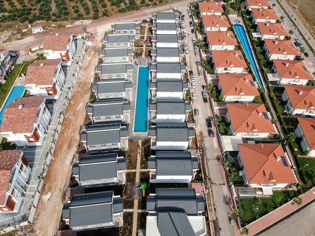 Виллы 4+1 в комплексе в Дошемеальты Анталья