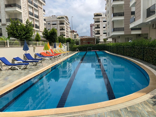 Квартира 1+1 с мебелью в микрорайоне Хурма Коньяалты Анталья