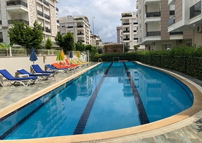 Квартира 1+1 с мебелью в микрорайоне Хурма Коньяалты Анталья