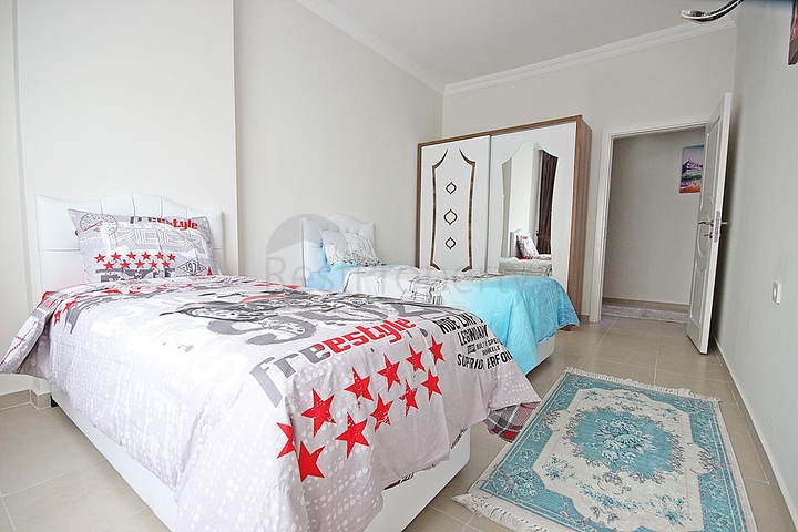 Трехкомнатная квартира с мебелью в районе Махмутлар