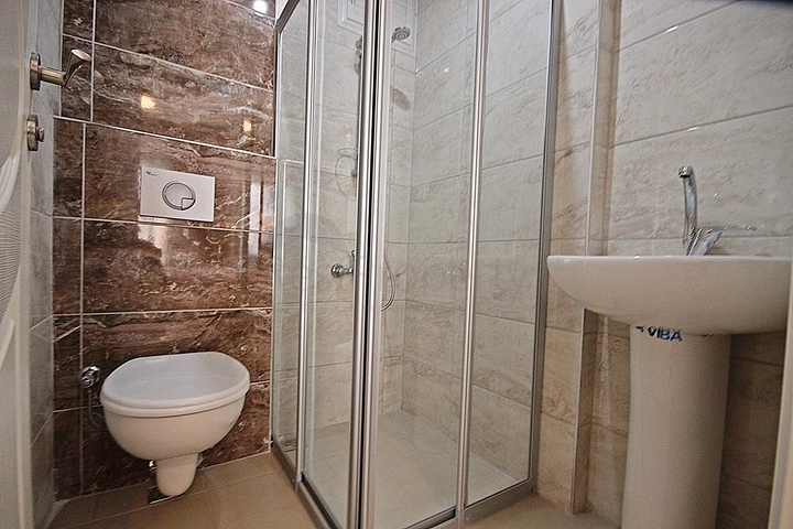 Трехкомнатная квартира с мебелью в районе Махмутлар