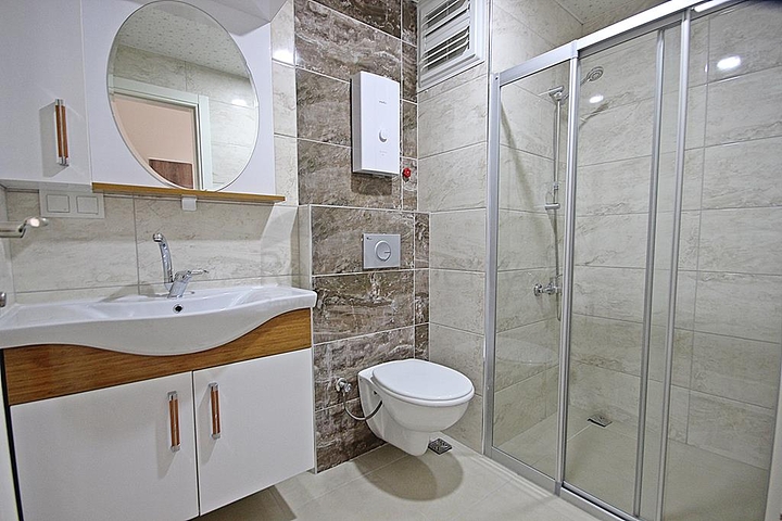 Трехкомнатная квартира с мебелью в районе Махмутлар