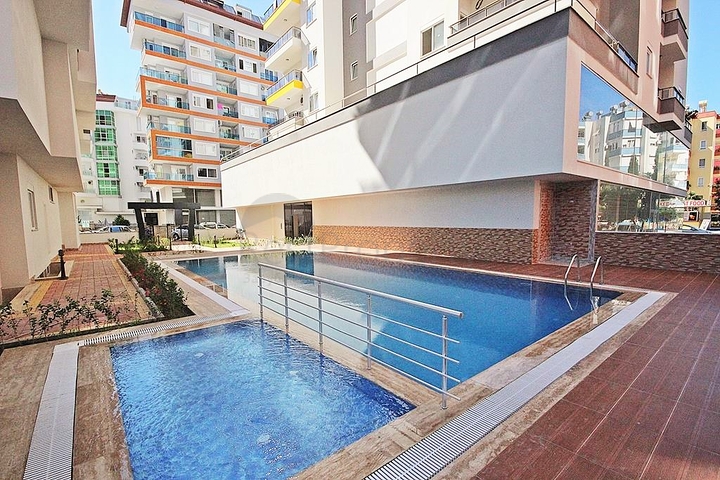 Трехкомнатная квартира с мебелью в районе Махмутлар