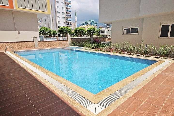 Трехкомнатная квартира с мебелью в районе Махмутлар