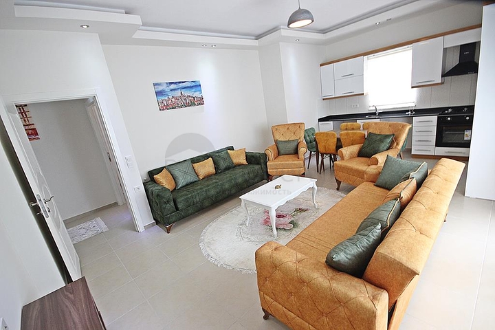 Трехкомнатная квартира с мебелью в районе Махмутлар