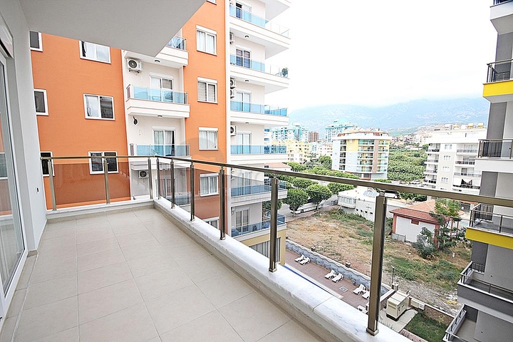 Трехкомнатная квартира с мебелью в районе Махмутлар