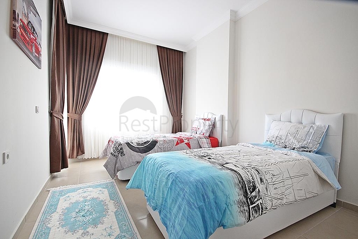 Трехкомнатная квартира с мебелью в районе Махмутлар