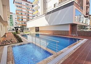 Трехкомнатная квартира с мебелью в районе Махмутлар