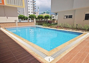 Трехкомнатная квартира с мебелью в районе Махмутлар