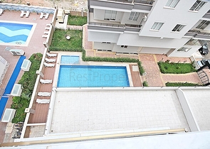 Трехкомнатная квартира с мебелью в районе Махмутлар