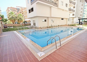 Трехкомнатная квартира с мебелью в районе Махмутлар