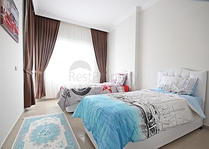 Трехкомнатная квартира с мебелью в районе Махмутлар