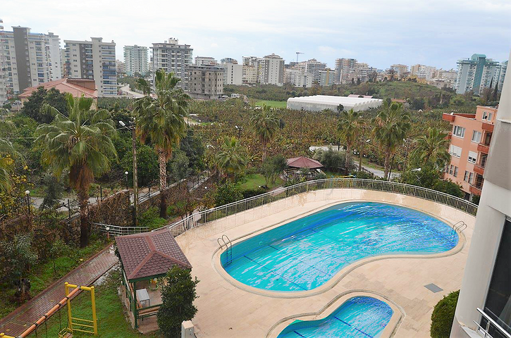 Квартира планировки 2+1 в районе Махмутлар