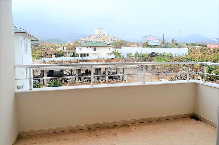 Квартира планировки 2+1 в районе Махмутлар