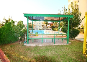 Квартира планировки 2+1 в районе Махмутлар